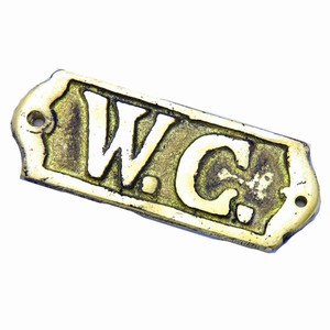W.C. Brass Sign